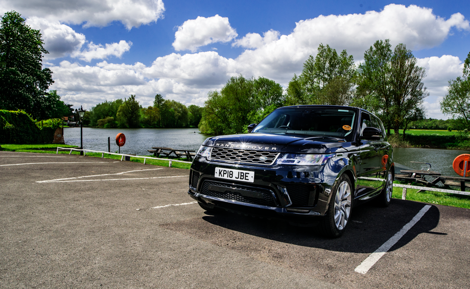 Shot of the Sixt Range Rover Sport rental in the English countryside